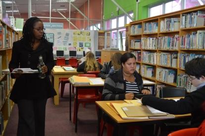 Legal aid clients in Cape Town, South Africa A staff member keeps an eye on legal clinic volunteers